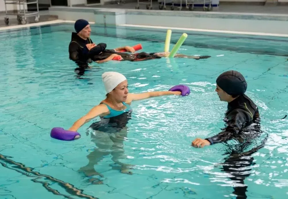 People taking part in a hydrotherapy session