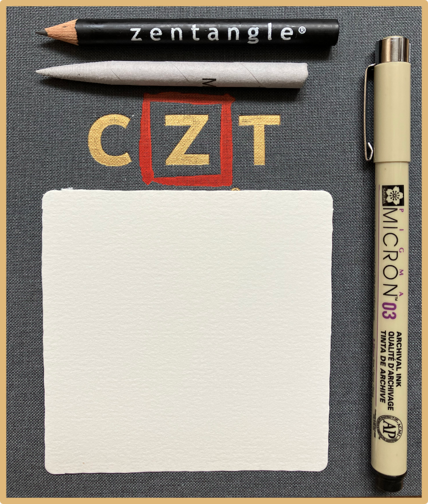Image on a blank Zentangle card square, with a small pencil and a tortillon positioned above the card square and a pen positioned down the right-hand-side of the card square. The letters CZT appear above the card square, below the pencil and tortillon.