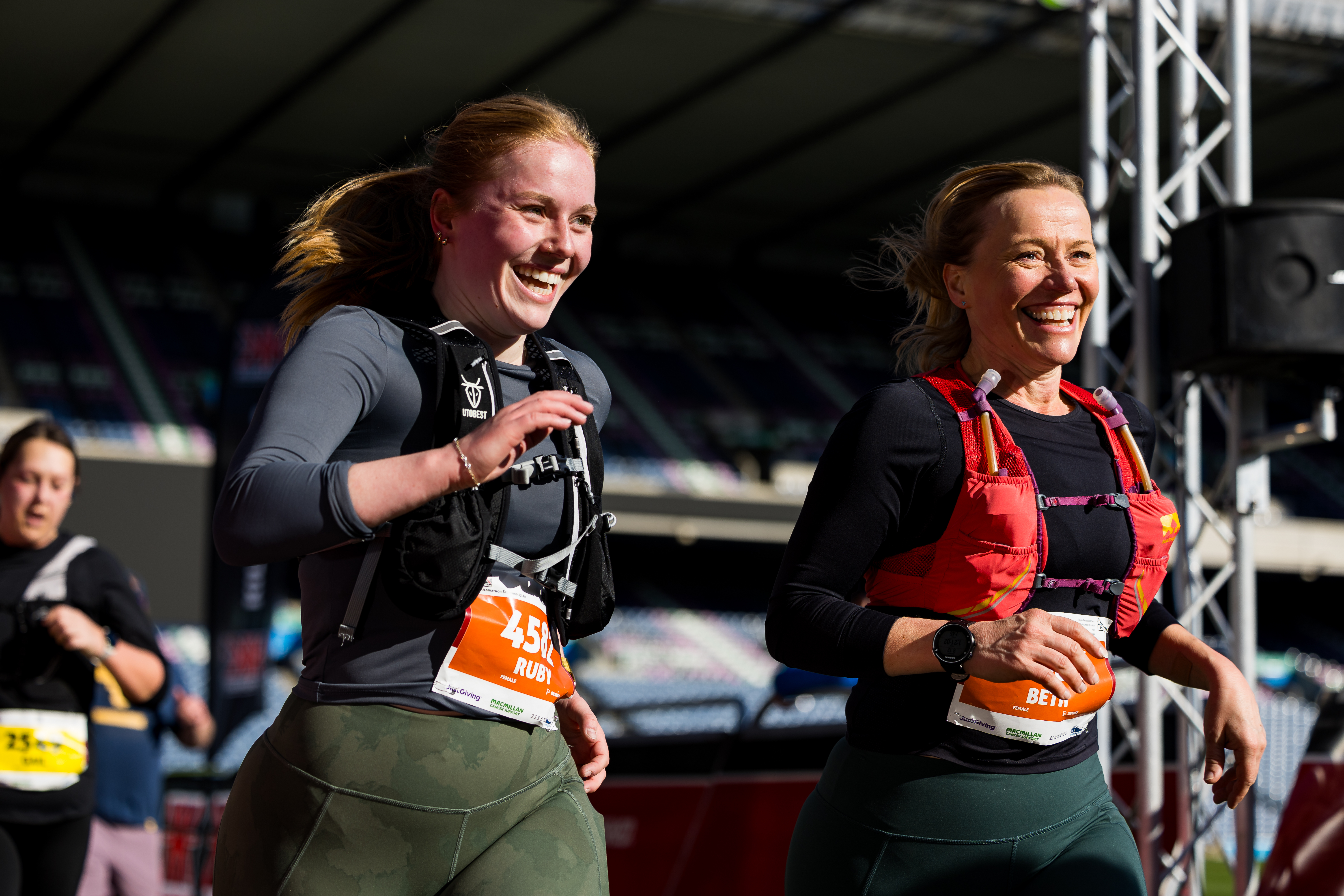 2026 Kilomathon Scotland, photo of event participants crossing the finish line with big grins on their faces